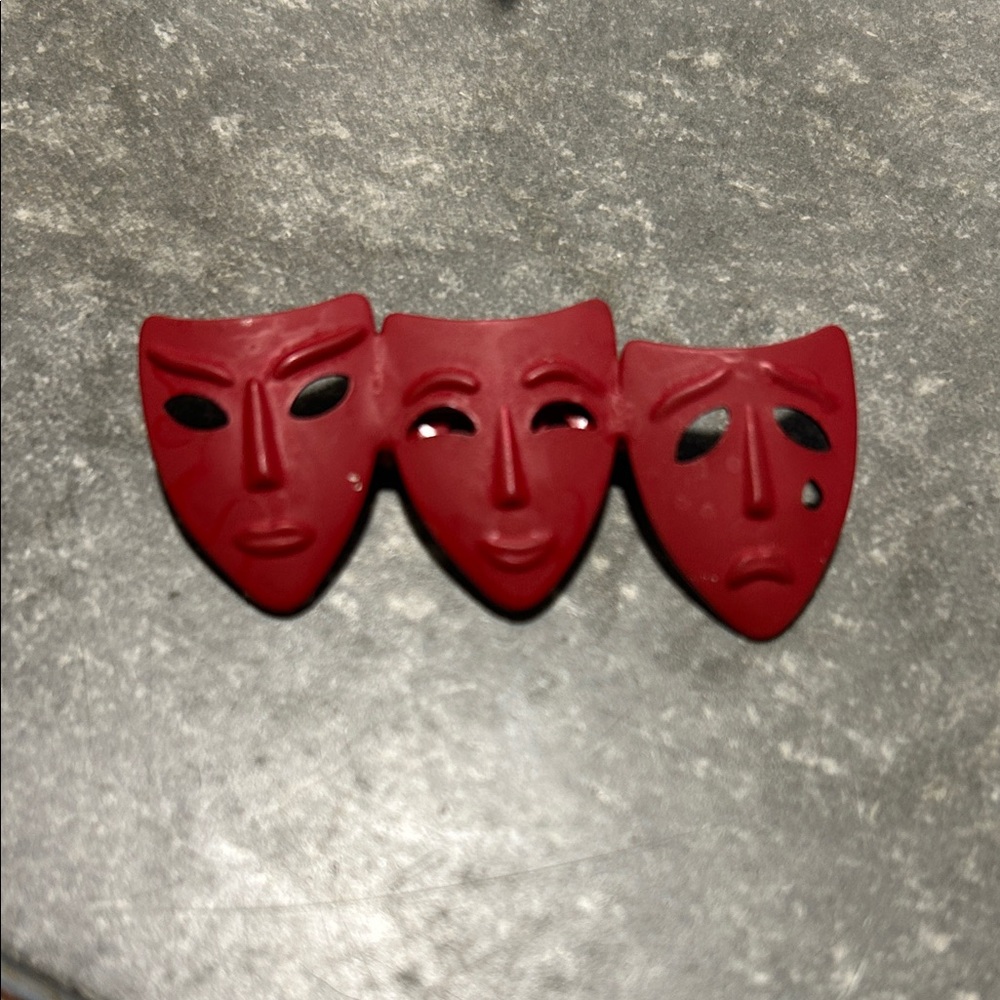 Drama mask brooch